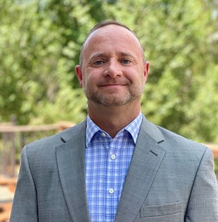 Headshot of Eric Bellas, owner of RSVP Colorado Springs